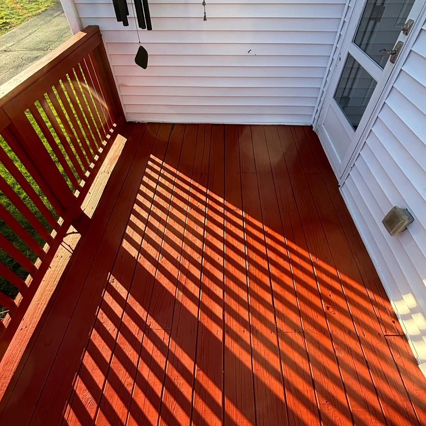 Restored and stained deck by Tauro Builders