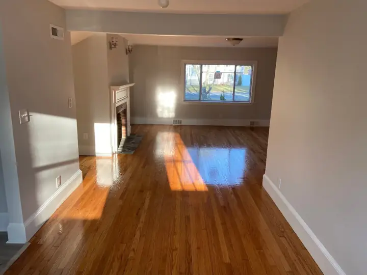 Refinished hardwood floors by Tauro Builders