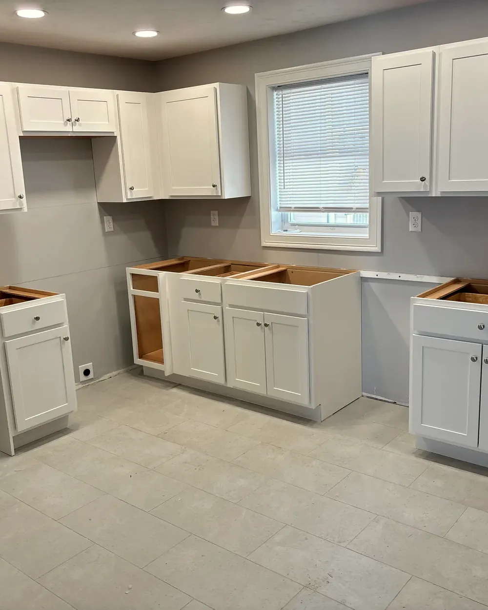 Kitchen cabinet installation by Tauro Builders